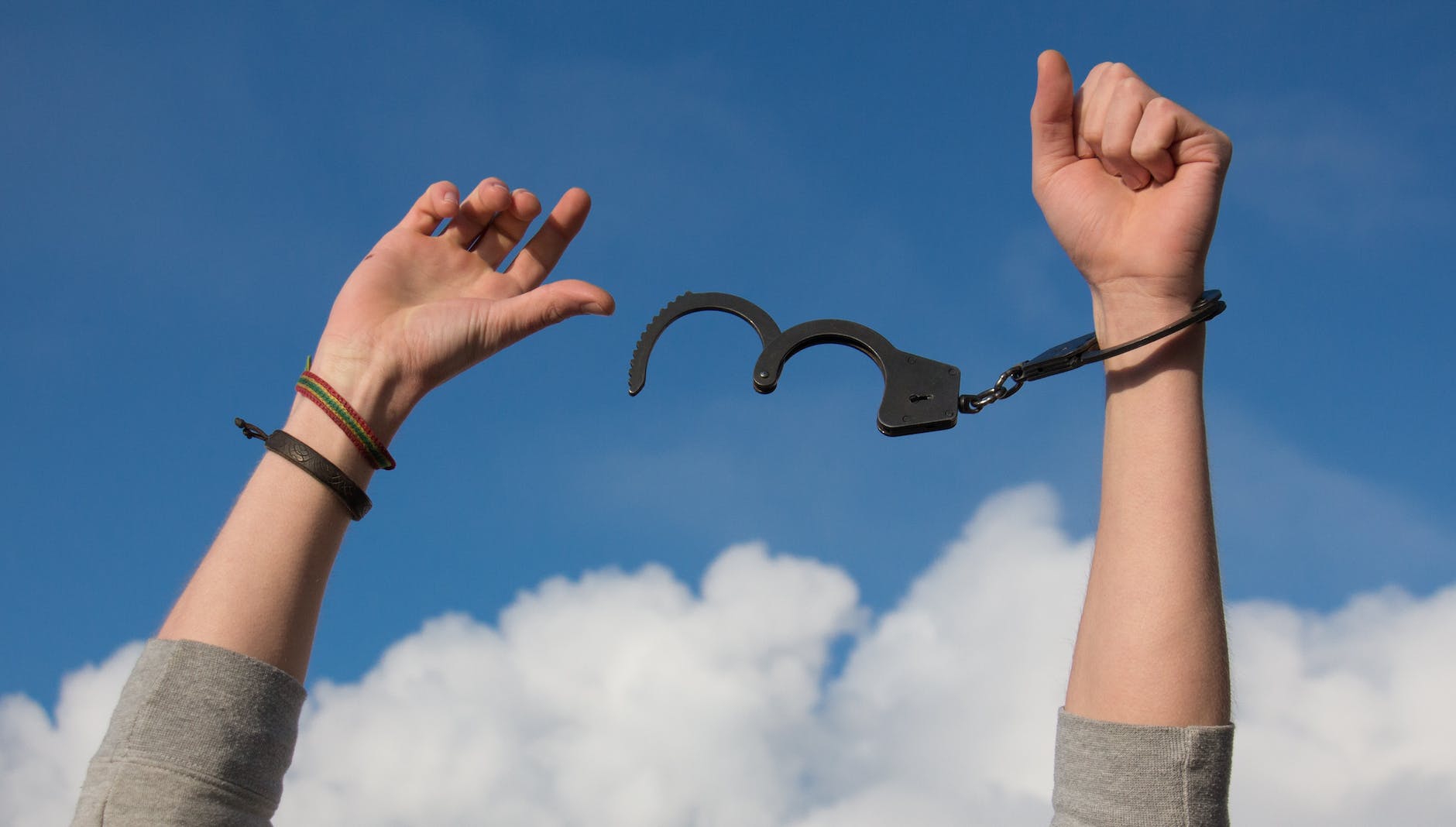 Breaking free from Narcissistic abuse - Illustration of a person breaking chains symbolizing liberation and empowerment.