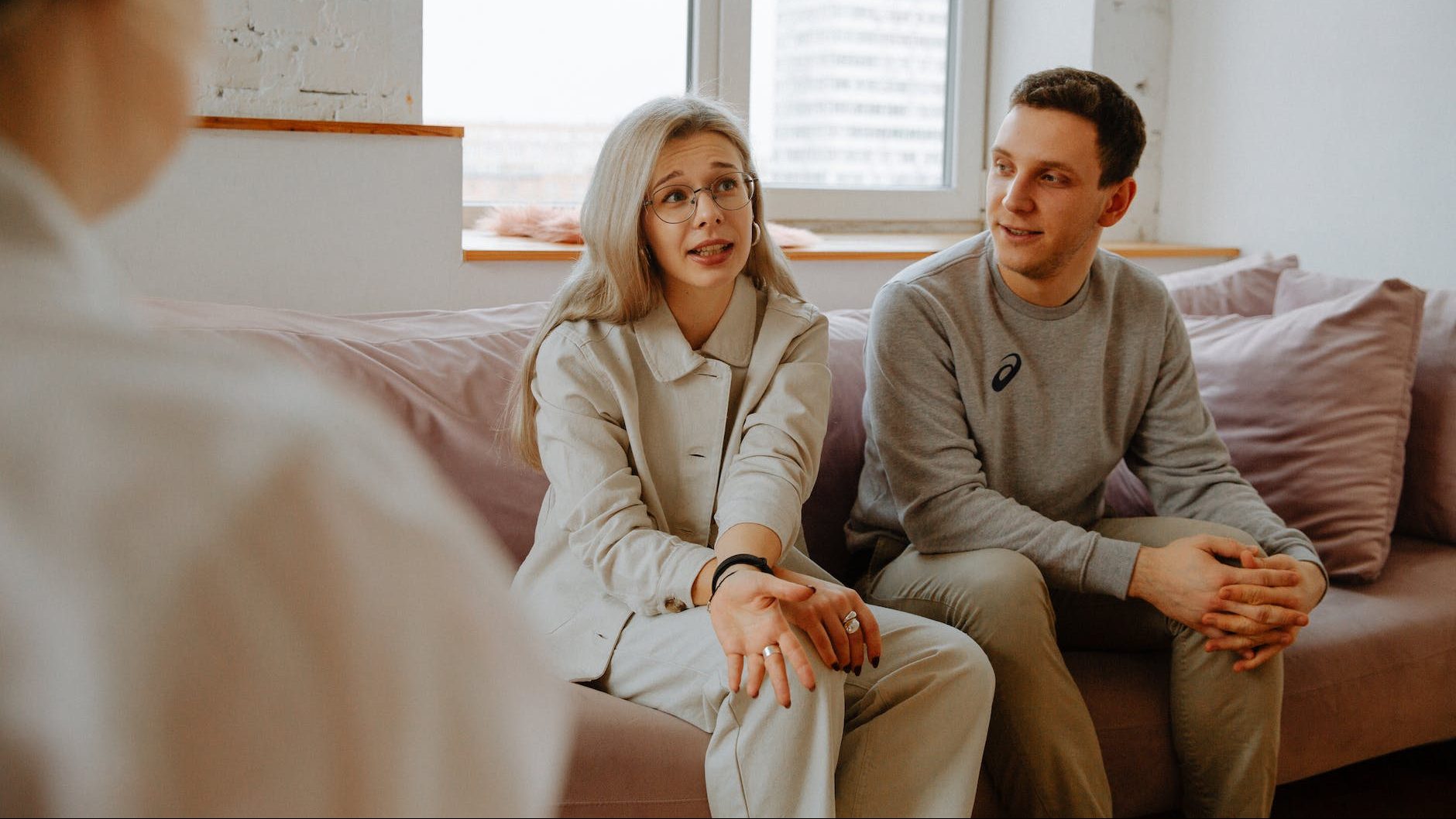 Therapist supporting client in rebuilding trust after Narcissistic abuse - Therapist providing support and validation to a client in a counseling session.