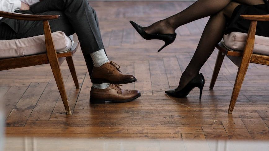 Therapist supporting client in Narcissistic abuse recovery - Compassionate therapist providing support and validation to a client.