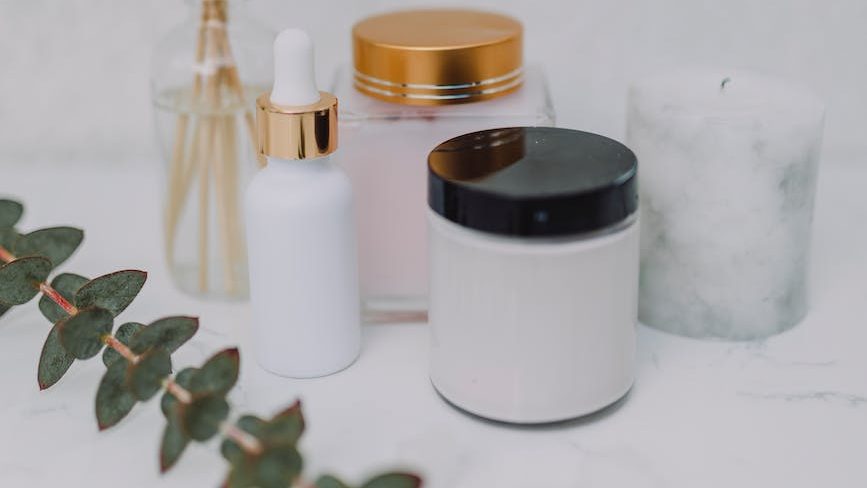 Self-care for Narcissistic abuse survivors - Collage of self-care items including candles, a journal, and a cup of tea.